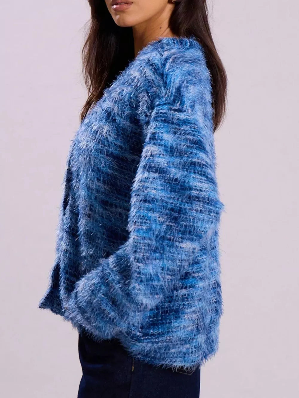 Blue textured knit cardigan with fuzzy yarn detail and button closure