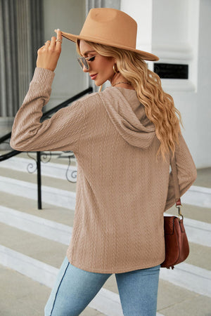 Textured henley hooded knit top in tan with long sleeves.
