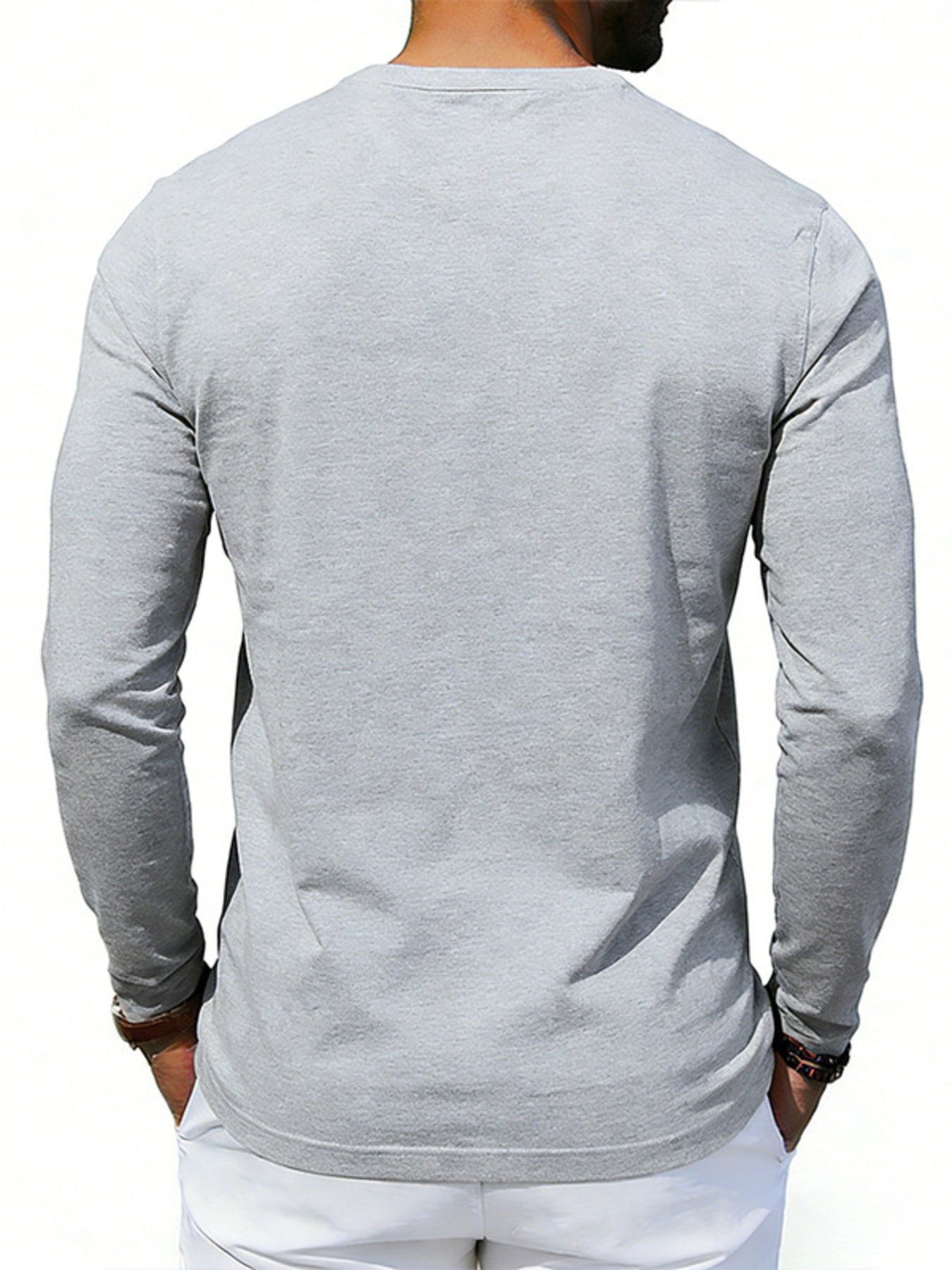 Gray long sleeve t-shirt with crew neck and buttoned placket detail.