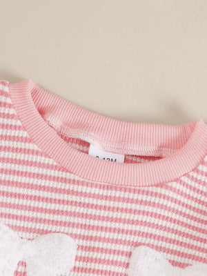 Pink and white striped baby set with bow accents and a ribbed neckline.