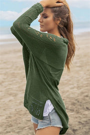 Army green open-knit cardigan with slit hem and diamond cutouts, acrylic.