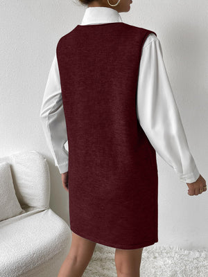 Burgundy knit sleeveless mini dress with pocket detail, styled over a white shirt.