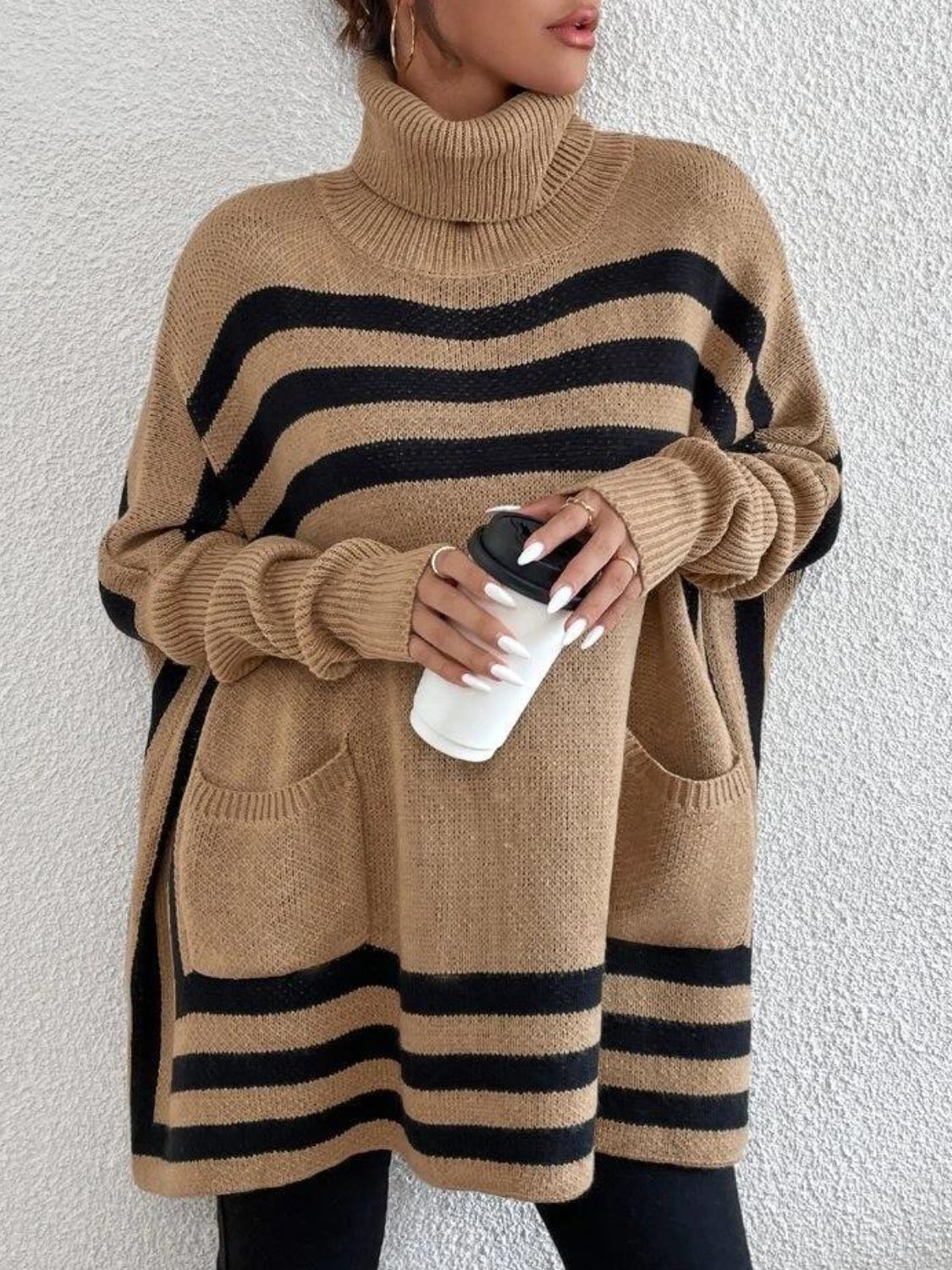 Tan geometric stripe knit poncho sweater with pockets and turtleneck