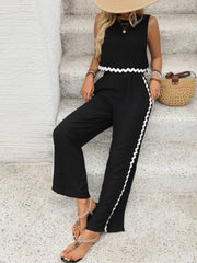 Black crop top and wide leg pants set with scalloped trim detail