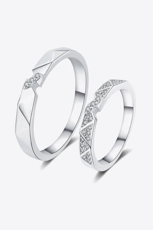 Geometric rhodium pavé ring set with cubic zirconia accents for men and women.