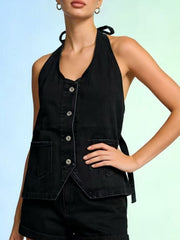 Black denim button-down halter vest with tie back and chest pockets