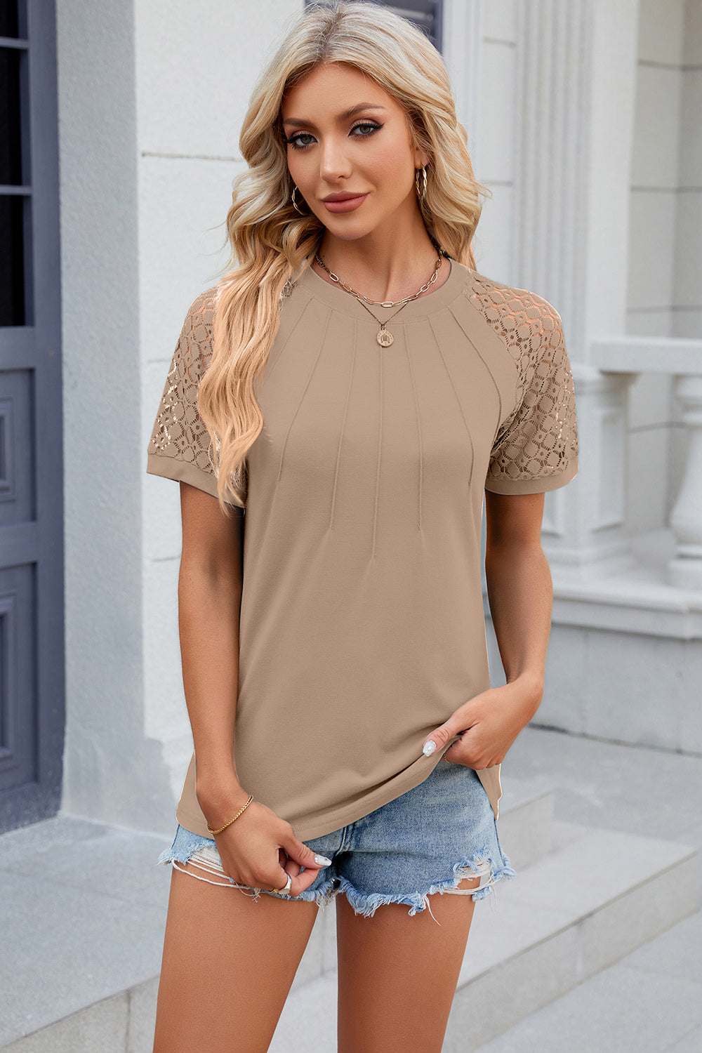 Khaki ribbed tee with lace raglan sleeves and a crew neck.