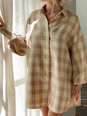 Pastel yellow plaid shirting jacket with ribbed cuffs and button front.