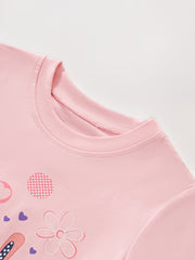 Pink toddler t-shirt with bunny, hearts, and flower graphics.