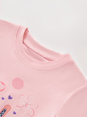 Pink toddler t-shirt with bunny, hearts, and flower graphics.