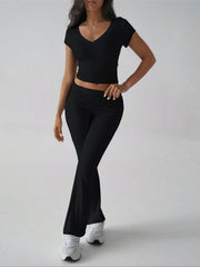 Black ribbed flare leg lounge pants with ruched waistband and v-neck crop top.