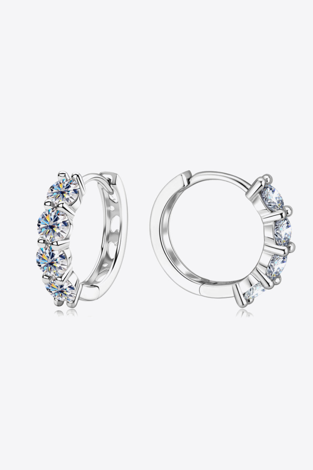 Silver pavé crystal huggie earrings with multiple round cut stones.