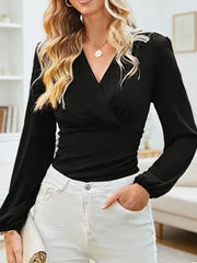 Black ruched sleeve wrap blouse with V-neck and bishop sleeves.
