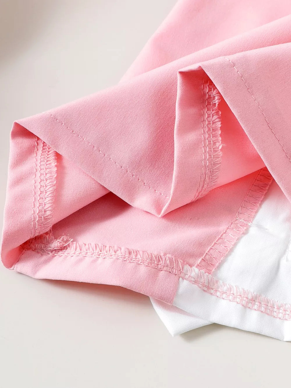 Children's Bow Puff Sleeve Dress in Pink, model styling view