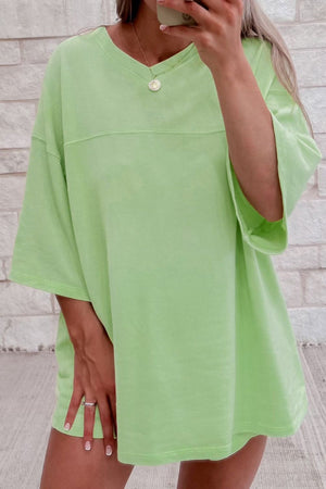 Relaxed fit lime cotton lounge set with V-neck and short sleeves.
