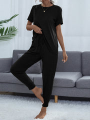 Black relaxed-fit tee and jogger lounge set with drawstring waist and cuffed ankles.