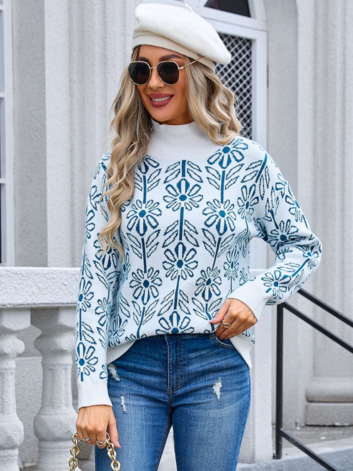 Peacock Blue geometric floral knit turtleneck pullover sweater with long sleeves.