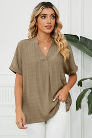 Camel linen blend blouse with V-neck, short sleeves, and subtle plaid texture.
