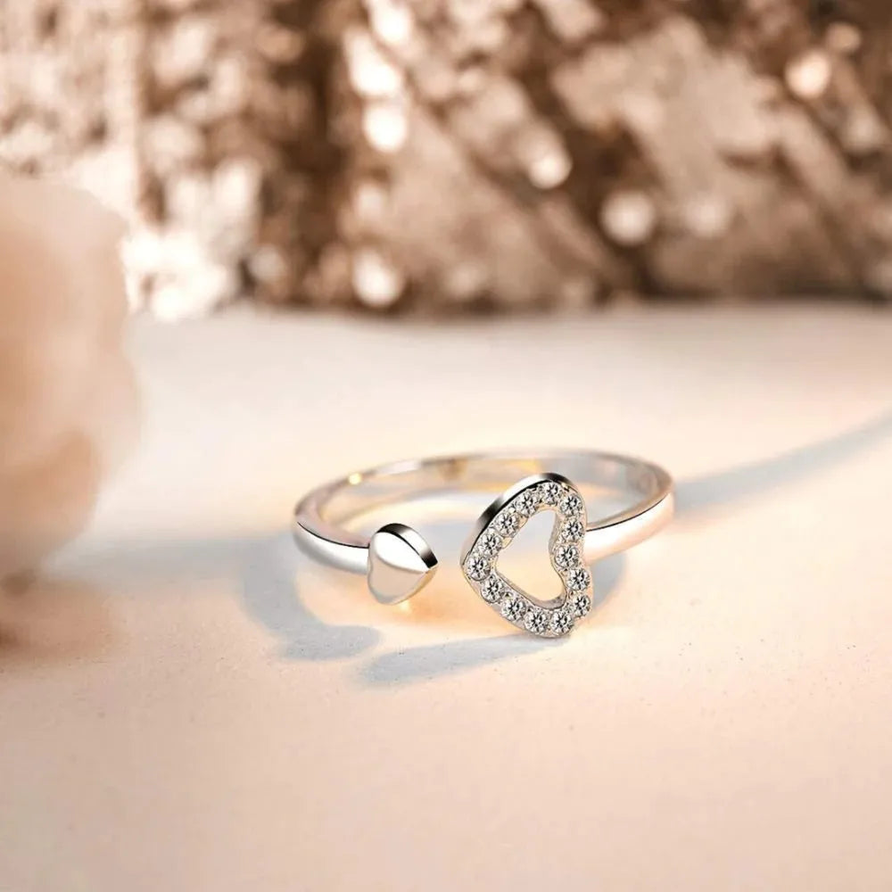 Silver open heart ring with pavé detail and adjustable band