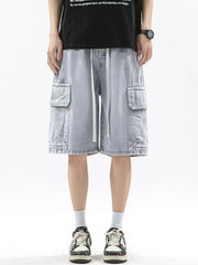 Men's light wash denim cargo shorts with drawstring and multiple pockets.