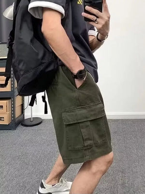 Men's green cotton cargo shorts with multiple pockets and a relaxed fit.