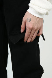 Black denim utility trousers with cargo pocket detail