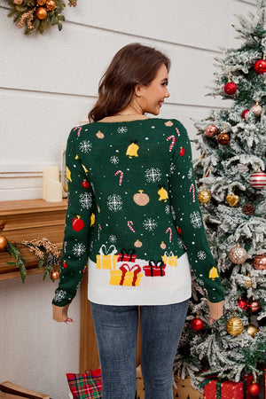 Dark green acrylic knit sweater with festive Christmas graphics including presents, candy canes, and snowflakes.