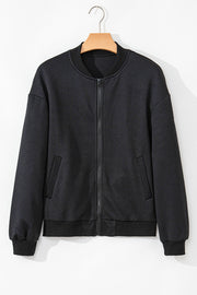 Black bomber jacket with diamond quilting and zip front.