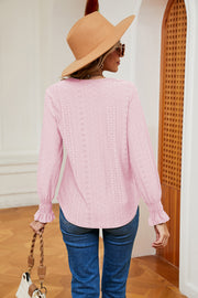 Blush pink eyelet blouse with lace trim and ruffle cuffs, long sleeves.