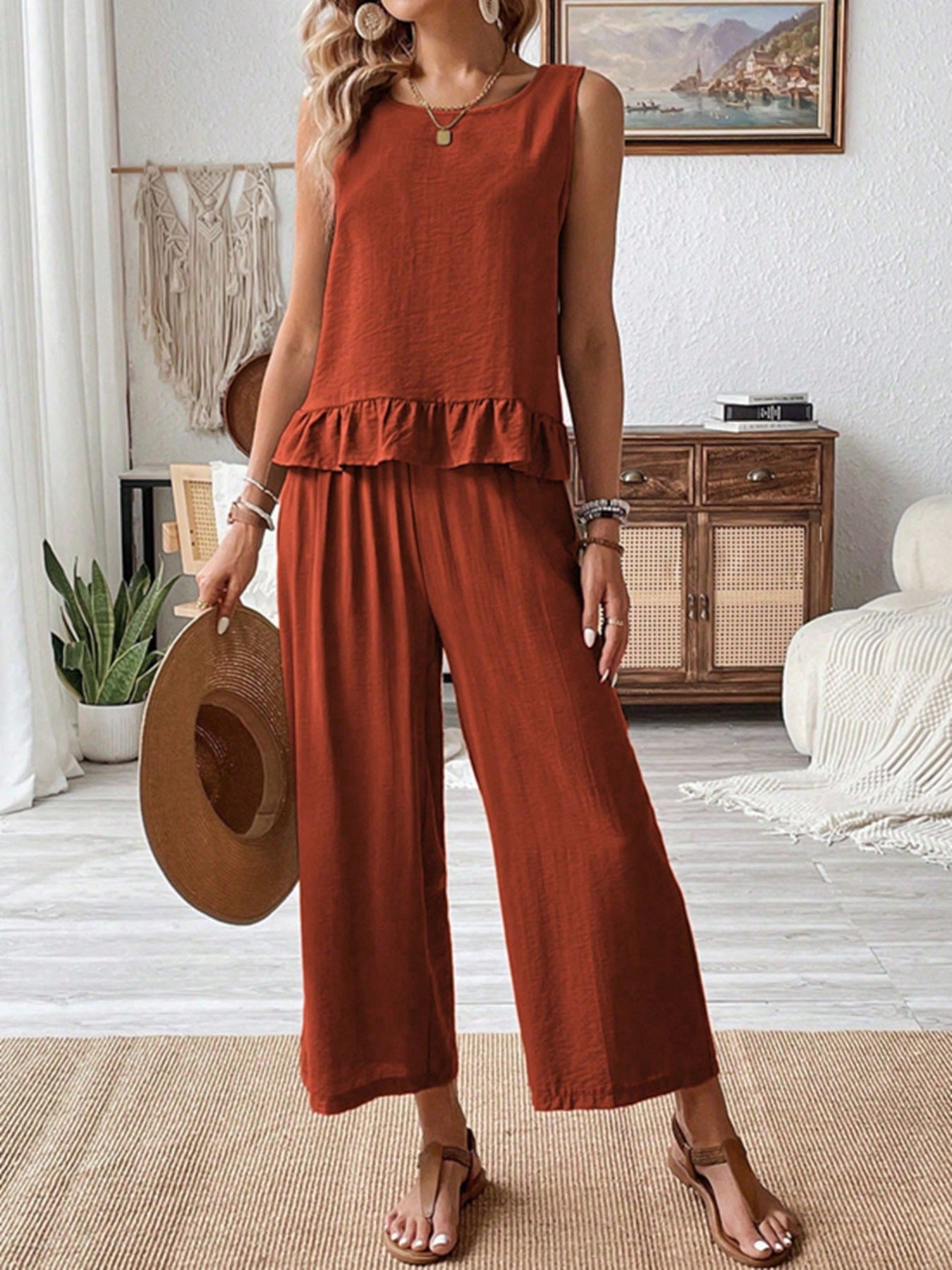 Ruffled hem tank top and flowing wide-leg pants set in rust orange, casual women's outfit