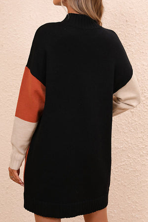 Geometric colorblock knit mini dress with black, camel, and ivory colorblocking.