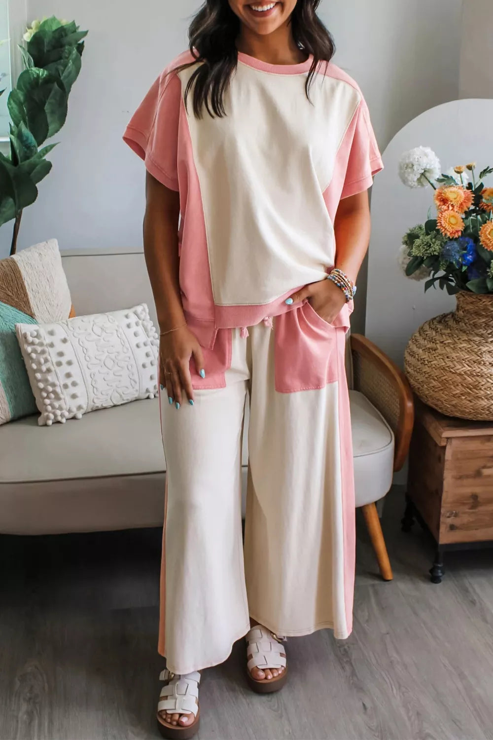 Chic color block cotton lounge set with cream and pink panels, crew neck top and wide leg pants.