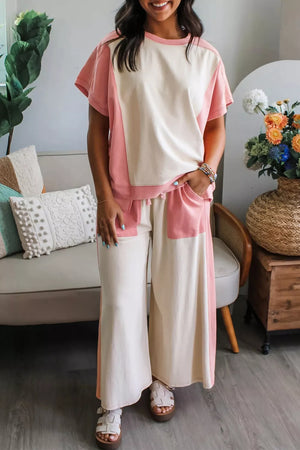 Chic color block cotton lounge set with cream and pink panels, crew neck top and wide leg pants.