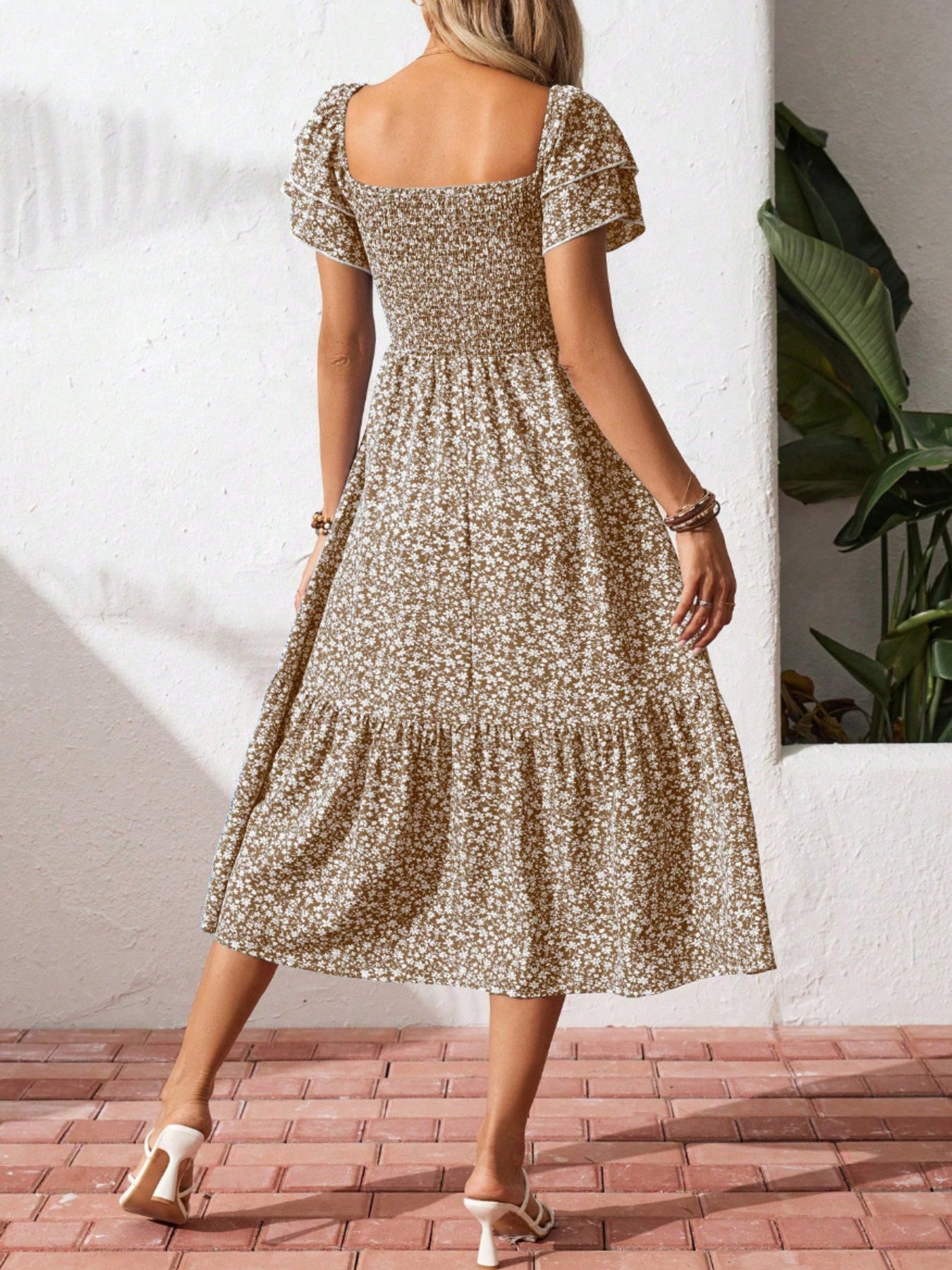 Floral smocked ruffle sleeve midi dress in khaki with tiered skirt and square neckline.