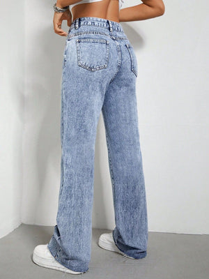Light acid wash bootcut jeans with split hem detail