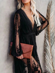 Black floral lace maxi dress with plunging neckline, long bell sleeves, and a thigh-high slit.