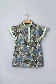 Botanical print cotton shirt with ruffle sleeves, green trim, and mandarin collar.