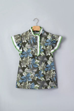 Botanical print cotton shirt with ruffle sleeves, green trim, and mandarin collar.