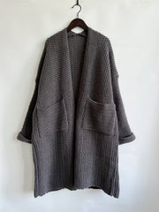 Chunky knit cocoon cardigan coat in charcoal with open front and patch pockets.
