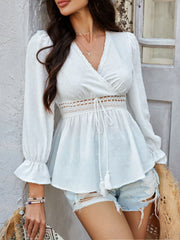 White Swiss dot wrap blouse with lace trim and tie waist