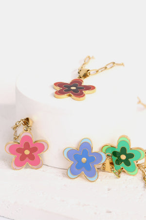 Enamel floral pendant chain necklace in red, pink, blue, and green on a gold-plated chain.