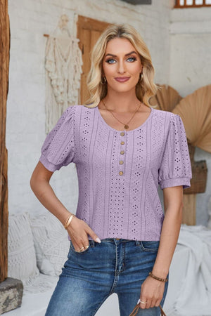 Lavender perforated puff sleeve henley blouse with button detail and eyelet pattern.
