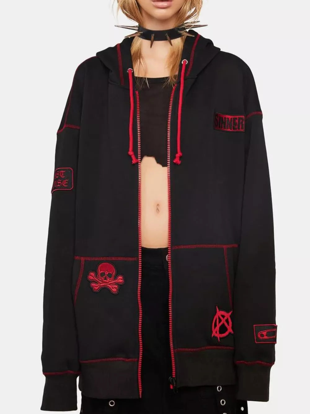 Black zip-up hoodie with red stitching, skull patch, and drawstring hood.