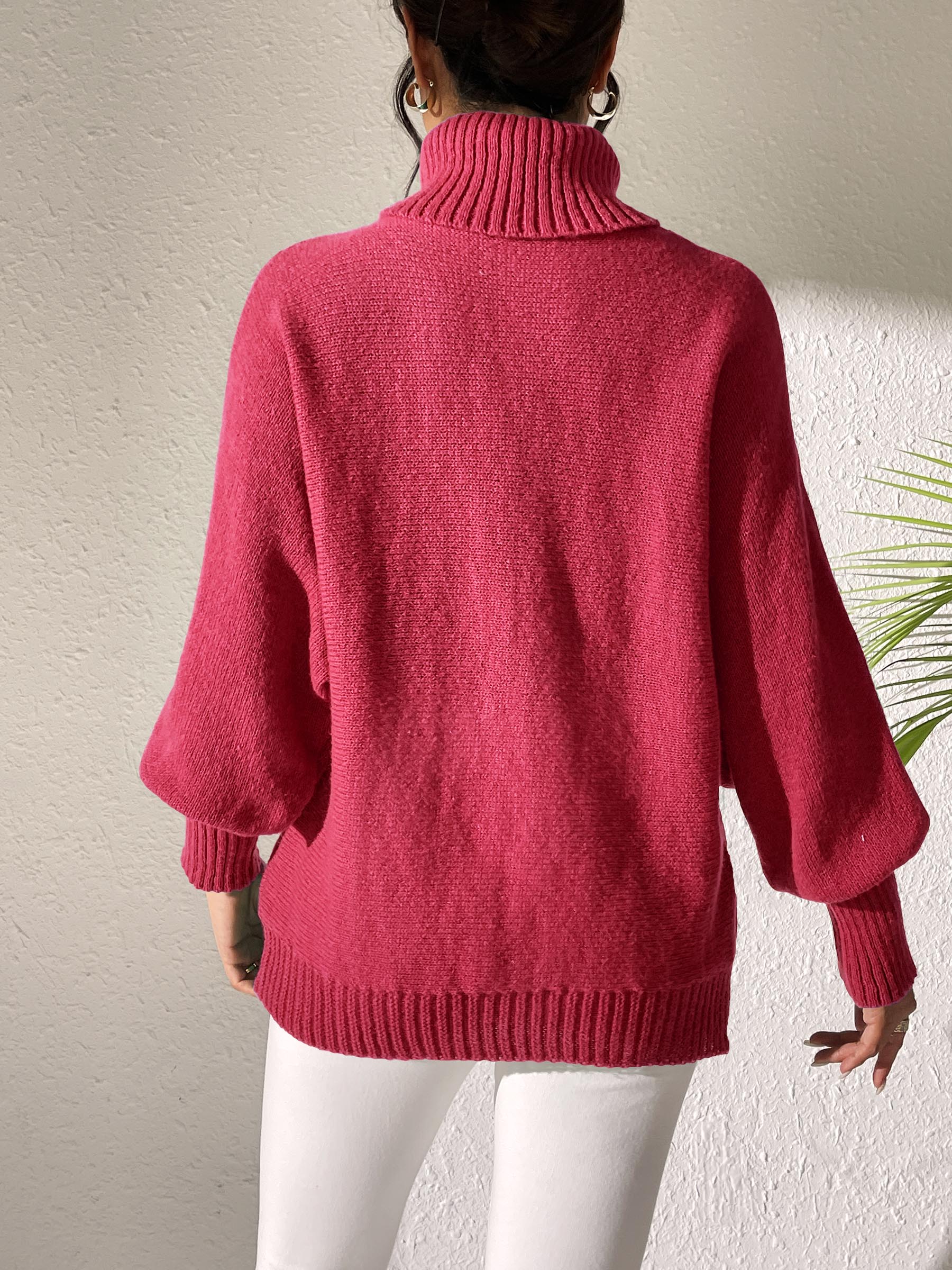 Balloon sleeve turtleneck sweater in Deep Red knit with ribbed cuffs and hem.