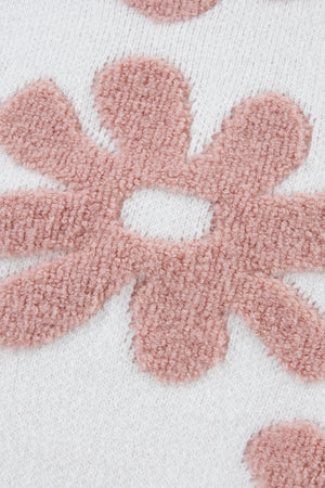 White knit pullover with textured pink floral pattern