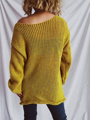 Mustard open-knit slouchy boatneck pullover sweater with ribbed texture and wide neckline.