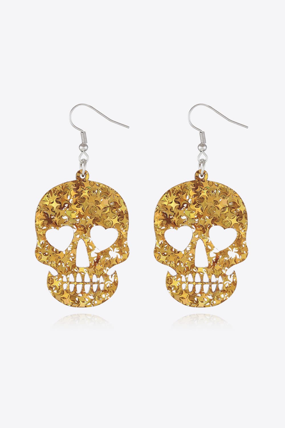 Gold glitter skull starburst dangle earrings with heart eye cutouts