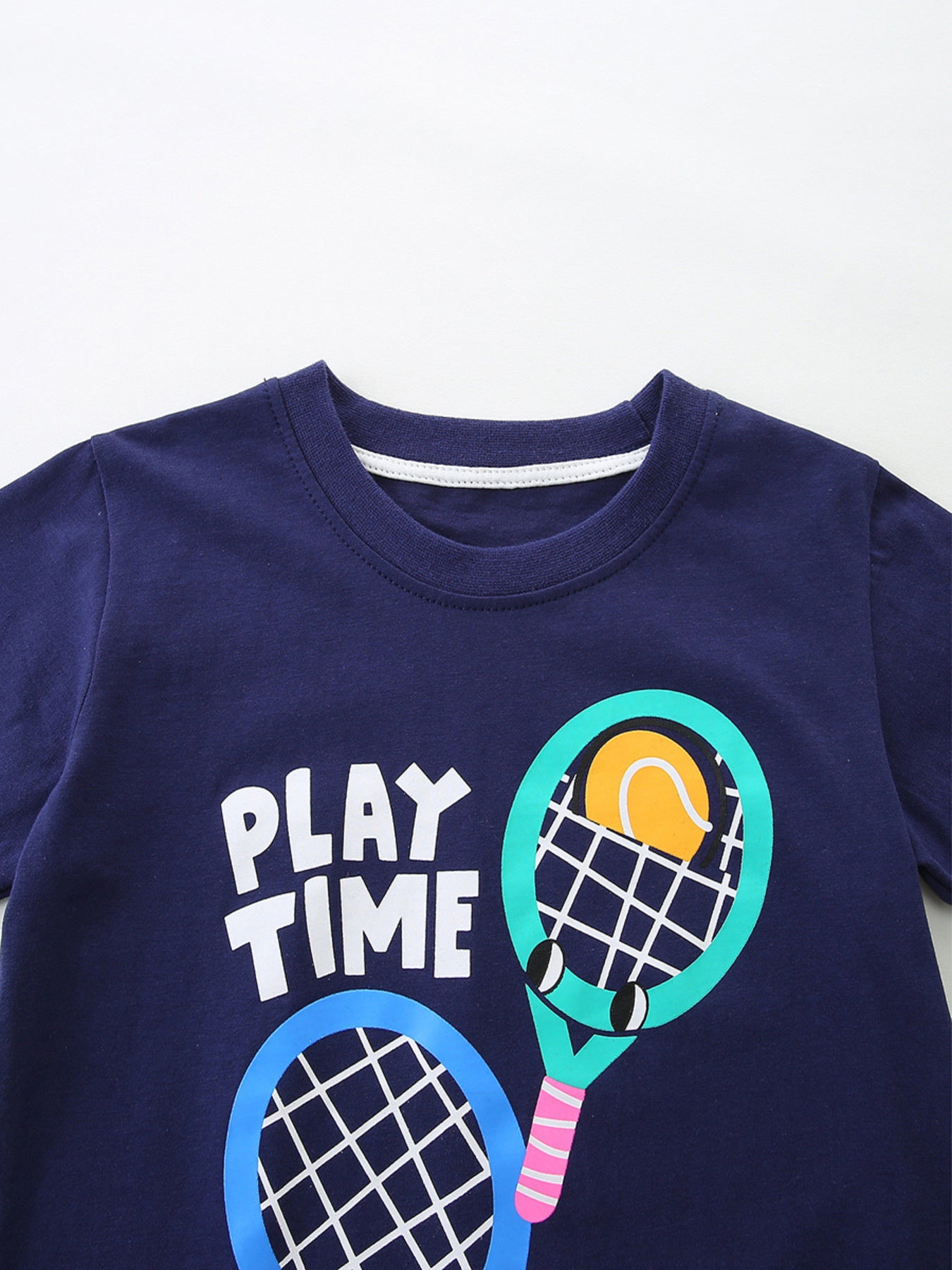 Navy cotton t-shirt with playful tennis graphic and "PLAY TIME" text