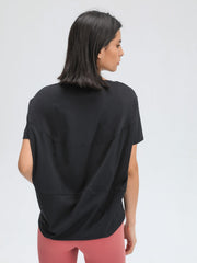 Black relaxed fit performance tee with short sleeves and a crew neck.