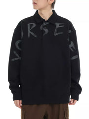 Black oversized polo sweatshirt with gray graphic letter print on chest and sleeves